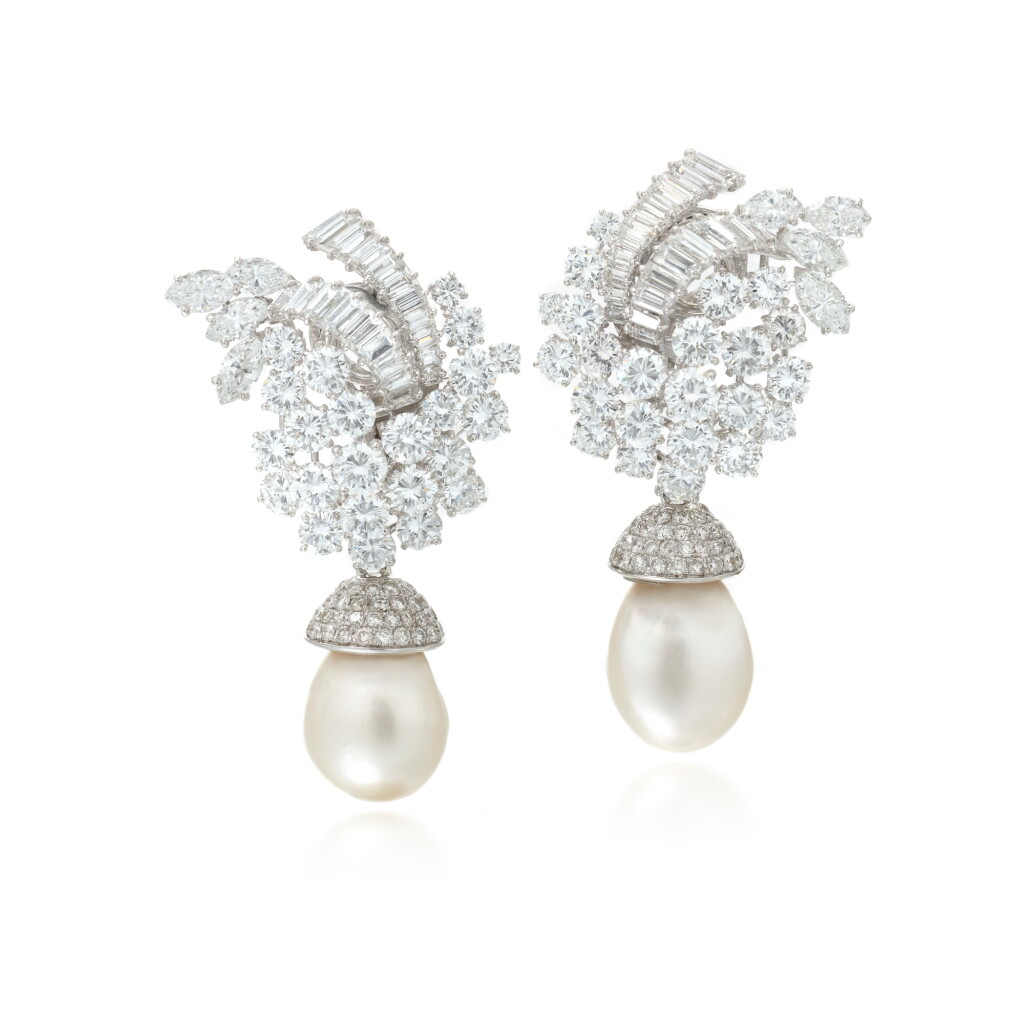 View full screen - View 1 of Lot 730. Pair of natural pearl and diamond ear clips, 1960s.