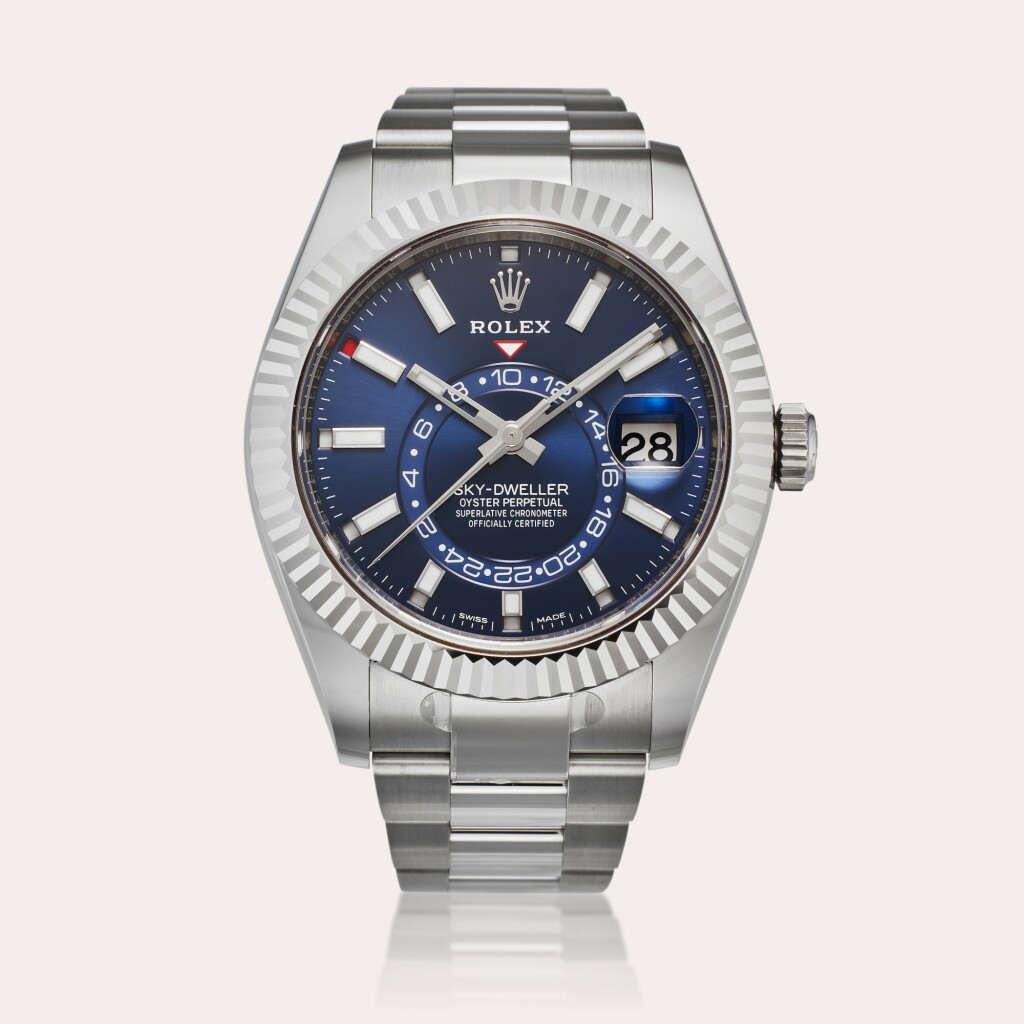 View full screen - View 1 of Lot 177. Reference 326934 Sky-Dweller | A stainless steel annual calendar dual time zone wristwatch with date and bracelet, Circa 2018.