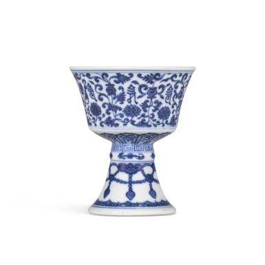 View full screen - View 1 of Lot 19. A blue and white 'lança' stem cup, Seal mark and period of Daoguang | 清道光 青花纏枝蓮梵文高足盃 《大清道光年製》款.