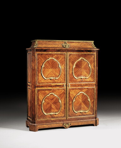 View full screen - View 1 of Lot 139. A LATE LOUIS XV GILT-BRONZE MOUNTED TULIPWOOD AND KINGWOOD CUPBOARD IN THE MANNER OF BVRB, CIRCA 1760-1770 | ARMOIRE EN PLACAGE DE BOIS DE ROSE ET BOIS DE VIOLETTE, BRONZE DORÉ, DE LA FIN DE L'ÉPOQUE LOUIS XV, VERS 1760-1770, DANS LE GOÛT DE BVRB.