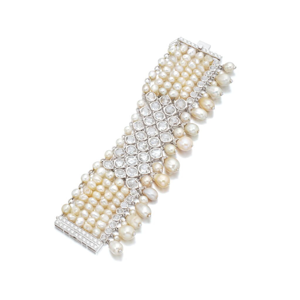 View full screen - View 1 of Lot 882. Natural pearl, cultured pearl and diamond bracelet.