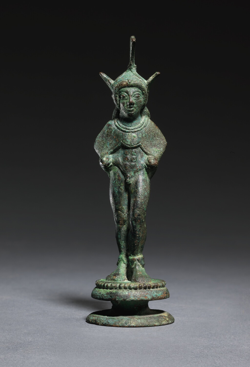 View full screen - View 1 of Lot 8. AN ETRUSCAN BRONZE FIGURE OF A WARRIOR, CIRCA 500-475 B.C..