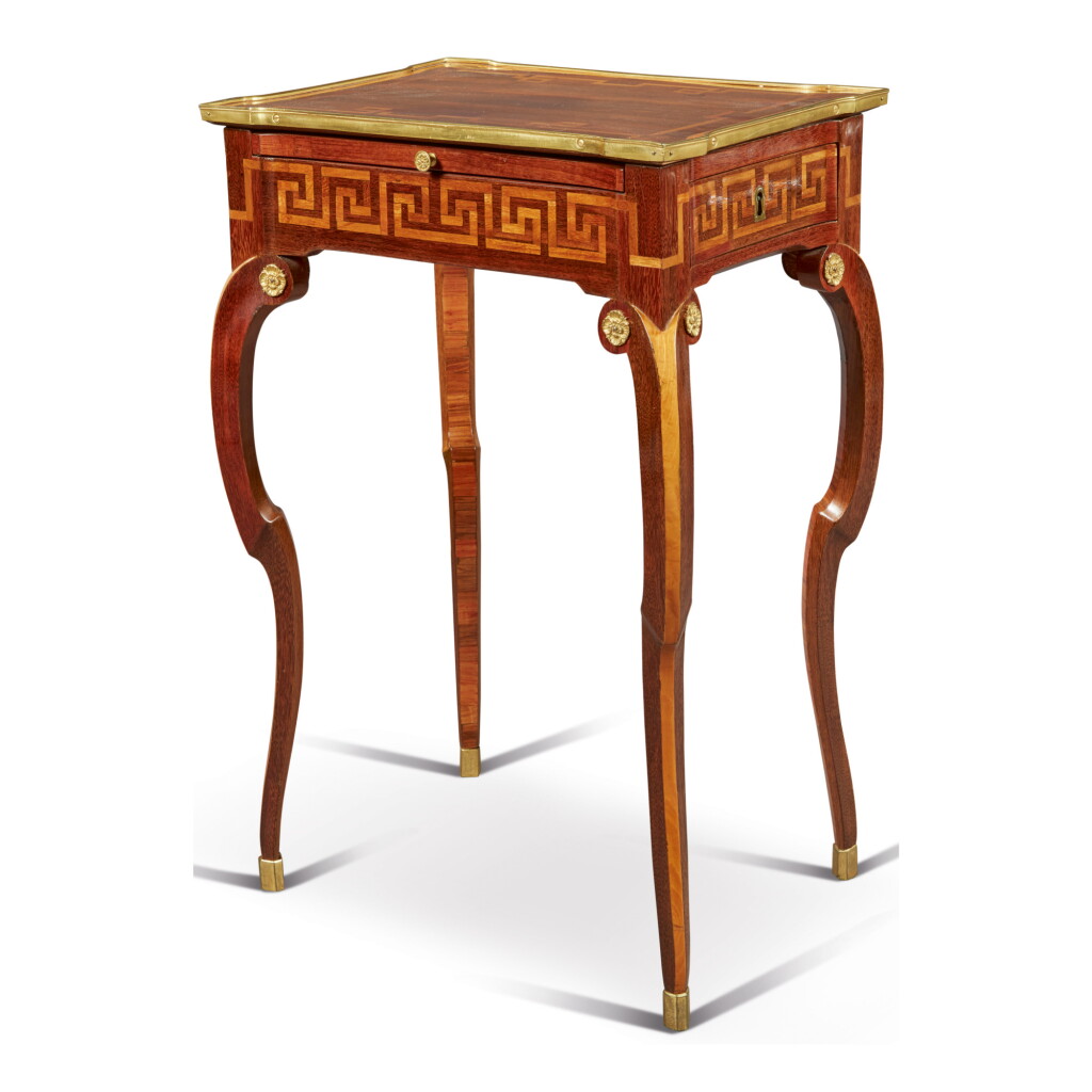 View full screen - View 1 of Lot 179. A LOUIS XV/XVI TRANSITIONAL GILT-BRONZE MOUNTED AMARANTH, CITRONNIER AND PARQUETRY TABLE À ÉCRIRE BY RVLC, CIRCA 1765 .