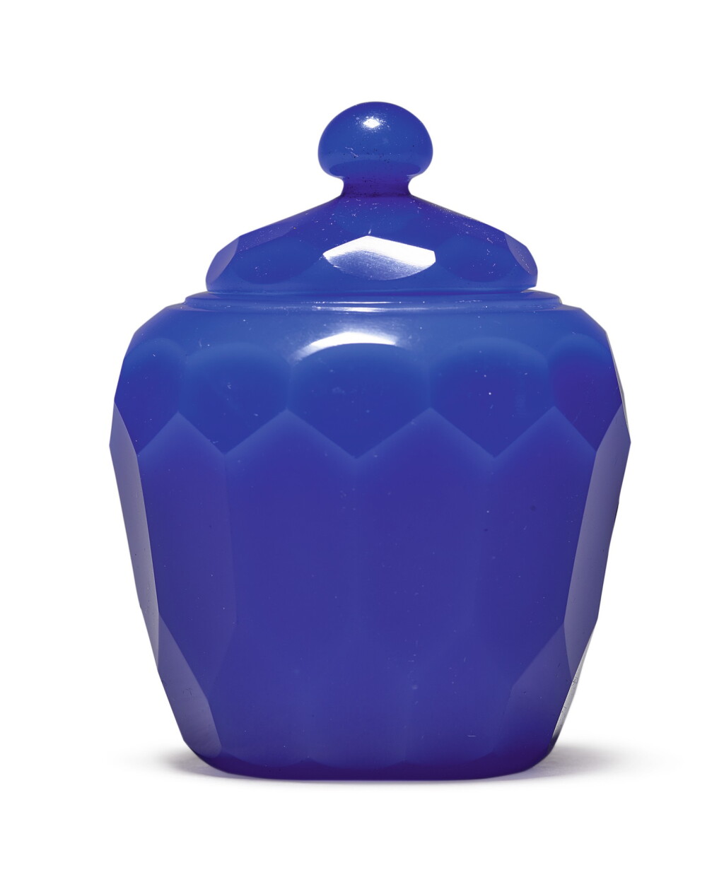 View full screen - View 1 of Lot 1011. A FACETED ROYAL-BLUE GLASS JAR AND COVER, QING DYNASTY, 18TH CENTURY.
