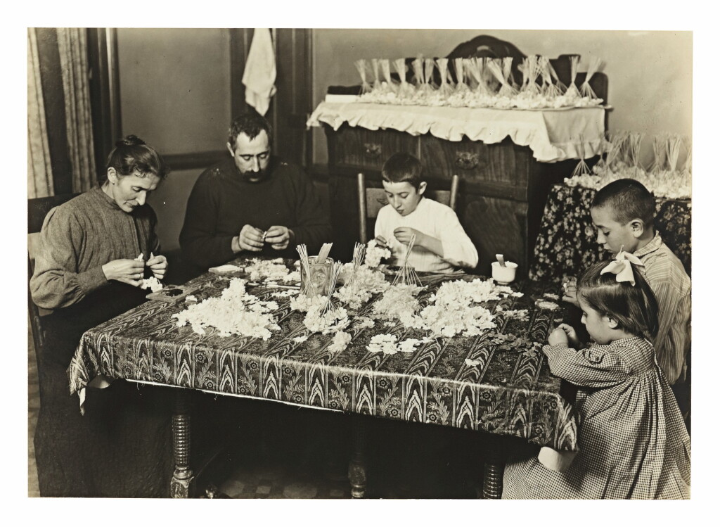 View full screen - View 1 of Lot 72. LEWIS W. HINE | FAMILY MAKING PAPER FLOWERS.