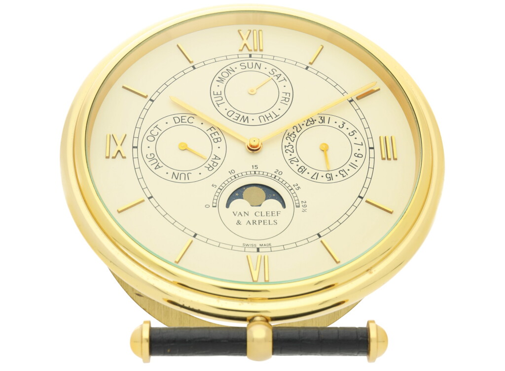 View full screen - View 1 of Lot 41. VAN CLEEF & ARPELS | LA COLLECTION A GILT BRASS TRIPLE CALENDAR DESK TIMEPIECE WITH MOON PHASES, CIRCA 1980.