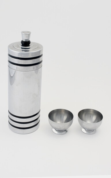 View full screen - View 1 of Lot 63. AN AMERICAN CHROME-PLATED AND BAKELITE 'GAIETY' COCKTAIL SHAKER AND PAIR OF COCKTAIL CUPS.