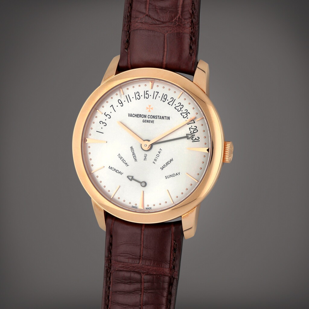 View full screen - View 1 of Lot 405. Patrimony, Reference 86020/000R-9239 | A pink gold retrograde day-date wristwatch | Circa 2007.