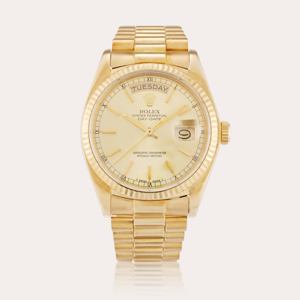 View full screen - View 1 of Lot 104. Reference 18038 Day-Date | A yellow gold automatic wristwatch with day, date and bracelet, Circa 1986.