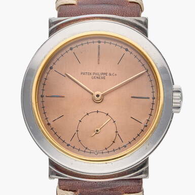View full screen - View 1 of Lot 508. Reference 544 | A stainless steel and pink gold wristwatch with pink dial and hooded lugs, Made in 1941.