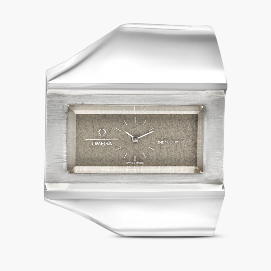 View full screen - View 1 of Lot 2281. De Ville Jeux d’Argent | A silver cuff watch, Circa 1970.