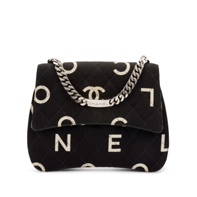 View full screen - View 1 of Lot 162. Black and White Quilted Printed Canvas CC Logo ID Bracelet Chain Flap Bag, 1997.
