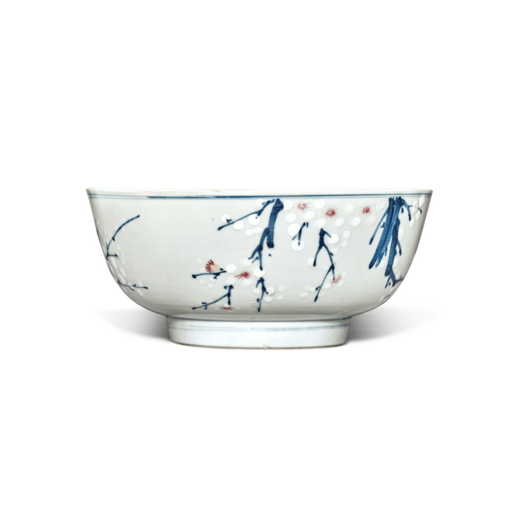 View full screen - View 1 of Lot 336. An underglaze-blue, copper-red and slip-decorated 'prunus' bowl, Qing dynasty, Kangxi period | 清康熙 青花釉裏紅堆白梅花紋盌 .