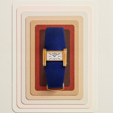 View full screen - View 1 of Lot 19. Driver | A very rare yellow gold triangular prism-form driver’s rear-wound wristwatch with gold deployant buckle | Circa 1945-46.