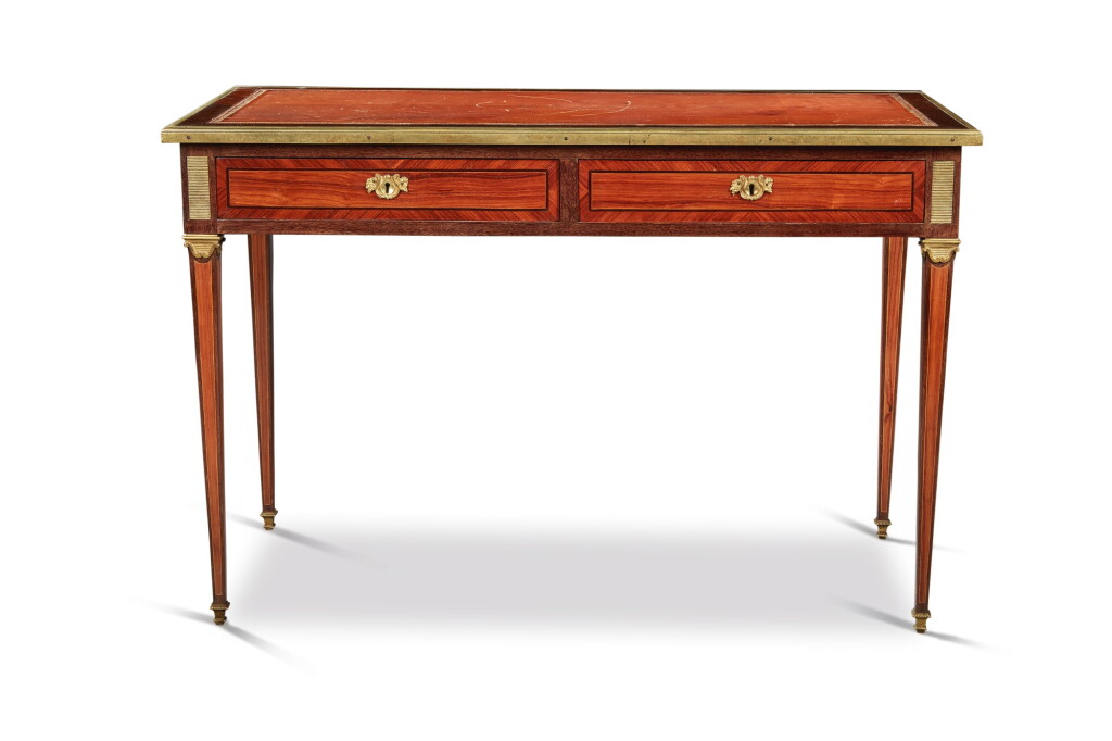 View full screen - View 1 of Lot 100. A Louis XVI Gilt-Bronze Mounted Amaranth and Kingwood Writing Table by Stumpff, Circa 1775.