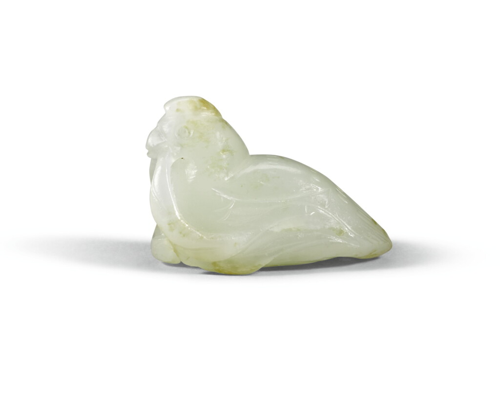 View full screen - View 1 of Lot 68. A PALE CELADON JADE MANDARIN DUCK PENDANT, MING DYNASTY | 明 青白玉寶鴨.