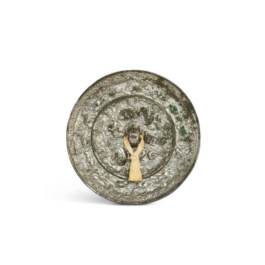 View full screen - View 1 of Lot 305. A bronze Replica Belts ea beasts and grapes' mirror, Tang dynasty 唐 青銅海獸葡萄紋鏡.