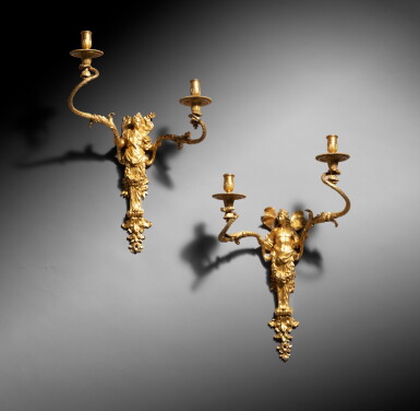 View full screen - View 1 of Lot 29. A pair of French Régence giltbronze wall-lights, Flora and Zephir, circa 1720 | Paire d'appliques Flore et Zéphir en bronze doré d'époque Régence, vers 1720.