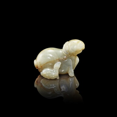 View full screen - View 1 of Lot 3021. A celadon jade 'ewe and lamb' group, Ming dynasty or earlier 明或更早 白玉子母臥羊擺件.