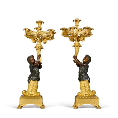 View full screen - View 1 of Lot 146. A pair of Napoleon III gilt and patinated bronze figural seven-light candelabra, late 19th century.
