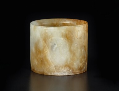 View full screen - View 1 of Lot 49. A rare pale gray and russet jade bracelet, Western Zhou dynasty | 西周 玉波曲紋鐲.