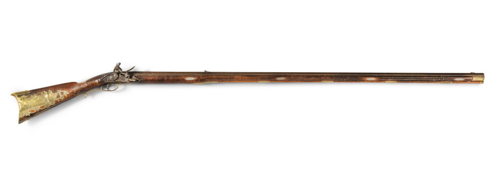 View full screen - View 1 of Lot 221. Extremely Fine and Rare Carved and Figured Maple, Engraved Brass, Silver Inlaid and Steel Flintlock American Long Rifle, Martin Fry III (1769-1841), York, Pennsylvania, Circa 1790.