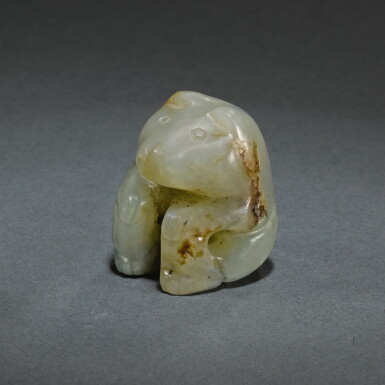View full screen - View 1 of Lot 143. A RARE SMALL JADE FIGURE OF A BEAR, SHANG DYNASTY | 商 玉熊.