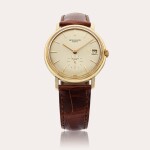 Reference 3445 Calatrava | Retailed by Serpico Y Laino: A yellow gold automatic wristwatch with date, Made in 1964