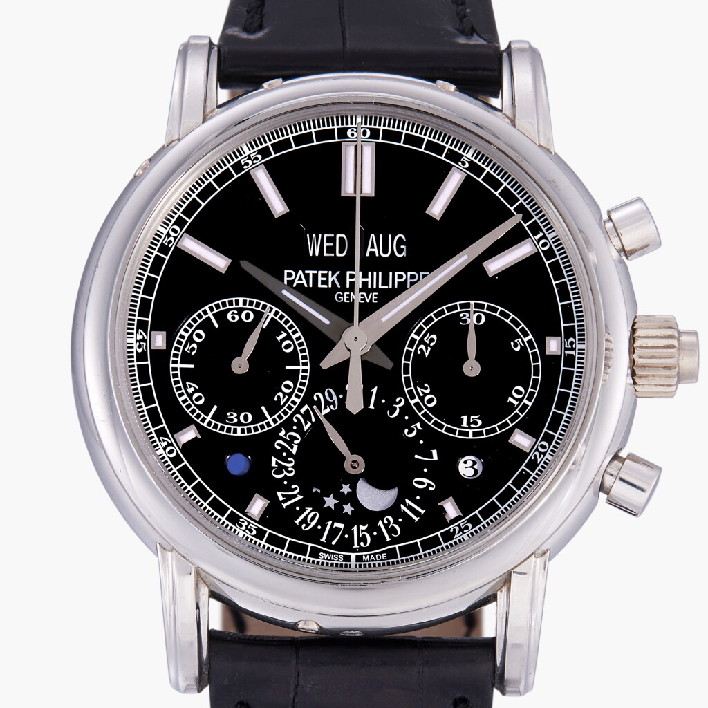 View full screen - View 1 of Lot 152. Reference 5204P-011 | A platinum perpetual calendar split-second chronograph wristwatch with moon phases, leap year and day/night indication | Circa 2016.
