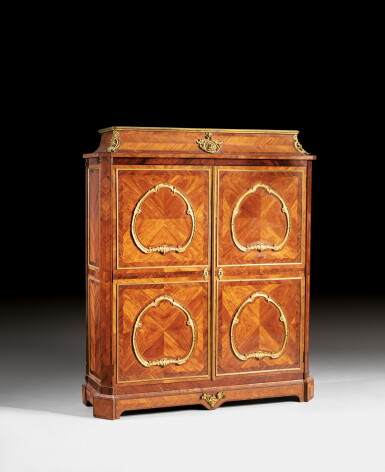 View full screen - View 1 of Lot 139. A gilt-bronze mounted tulipwood and kingwood cupboard in the manner of BVRB, late Louis XV, circa 1760-1770 | Armoire en placage de bois de rose et bois de violette, monture de bronze doré de la fin de l'époque Louis XV, vers 1760-1770, dans le goût de BVRB.