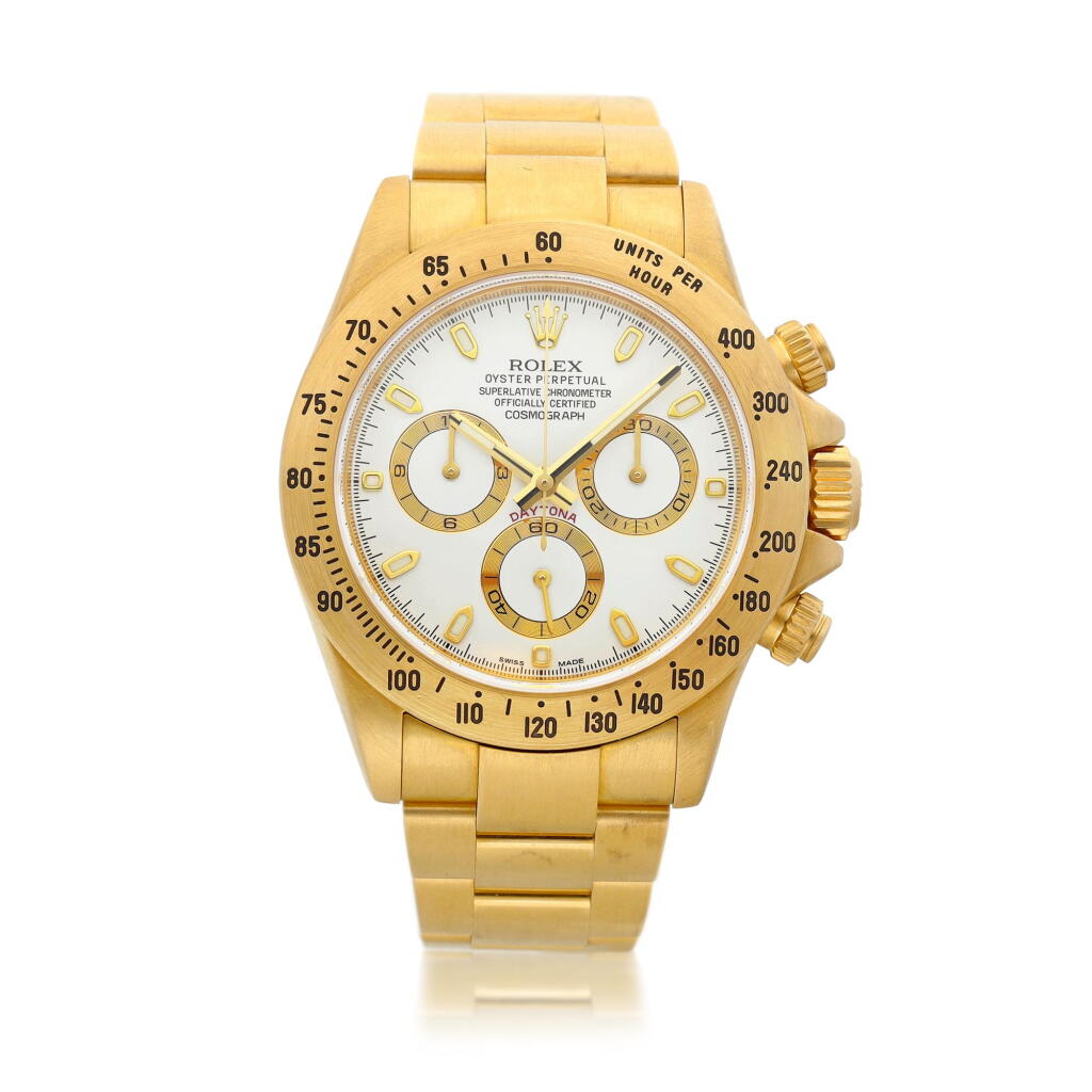View full screen - View 1 of Lot 2067. Cosmograph Daytona, Reference 116528 | A brushed yellow gold chronograph wristwatch with bracelet, Circa 2013, Formerly in the collection of Eric Clapton, CBE | 勞力士 | Cosmograph Daytona 型號116528 | 黃金計時鏈帶腕錶,約2013年製,原為 Eric Clapton, CBE 收藏.