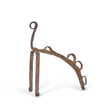 View full screen - View 1 of Lot 21. A wrought iron spit bracket, possibly 19th century.