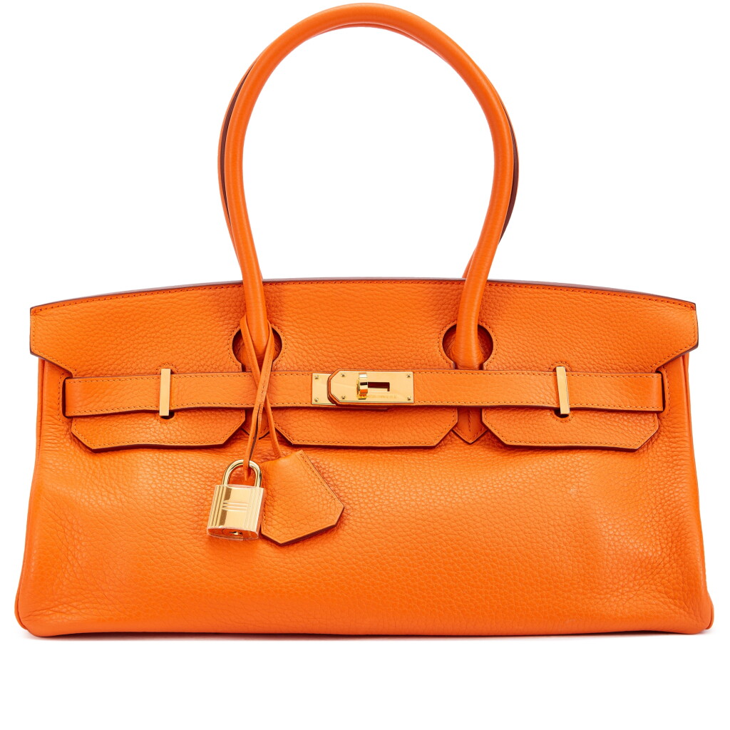 View full screen - View 1 of Lot 6166. Orange H Clémence JPG Shoulder Birkin 42 Gold Hardware, 2009 .
