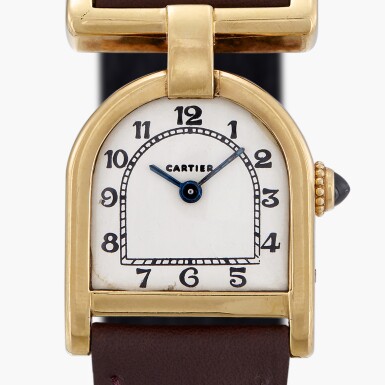 View full screen - View 1 of Lot 120. Stirrup | A yellow gold stirrup-form wristwatch with a gold deployant buckle | Made in 1976-77.