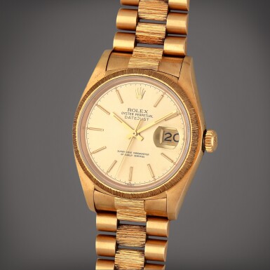 View full screen - View 1 of Lot 320. Datejust, Reference 16018 | A yellow gold wristwatch with date and bark bezel and bracelet | Circa 1978.