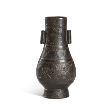 View full screen - View 1 of Lot 55. An archaistic bronze 'taotie' arrow vase, Ming dynasty.
