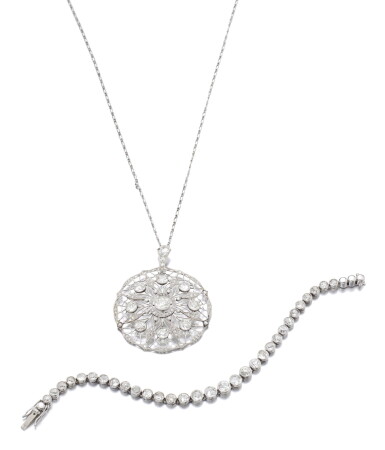 View full screen - View 1 of Lot 47. DIAMOND PENDENT NECKLACE AND BRACELET, CIRCA 1900.
