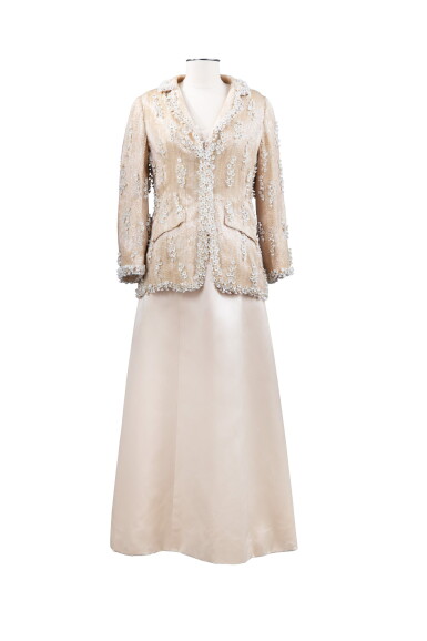 View full screen - View 1 of Lot 65. Roberto Capucci, Haute Couture, circa 1970, Richly embroidered jacket with pearls, with a long satin dress | Veste entièrement brodée de perles, robe longue satin .
