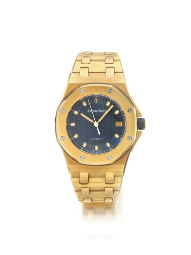 View full screen - View 1 of Lot 29. AUDEMARS PIGUET | REF D77217 ROYAL OAK OFFSHORE, A YELLOW GOLD AUTOMATIC CENTER SECONDS BRACELET WATCH WITH DATE CIRCA 2000.