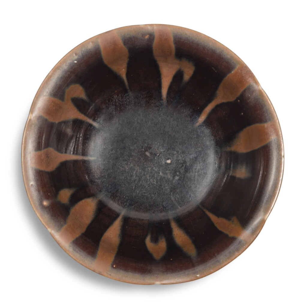 View full screen - View 1 of Lot 707. A 'Yaozhou' brown-glazed russet-splashed bowl, Northern Song dynasty | 北宋 耀州窰褐釉醬斑葵口盌.