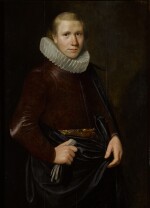 Portrait of a young man in a millstone collar, holding gloves, his right arm akimbo, three-quarter length