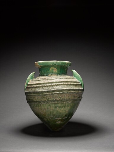 View full screen - View 1 of Lot 111. A large green-glazed pottery storage jar (tinaja), Spain or North Africa, Almohad, second half 12th/first half 13th century.