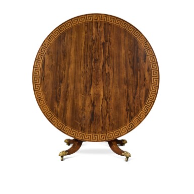 View full screen - View 1 of Lot 29. A Regency Gilt-Bronze Mounted Satinwood Inlaid Rosewood Circular Center Table, Early 19th Century.