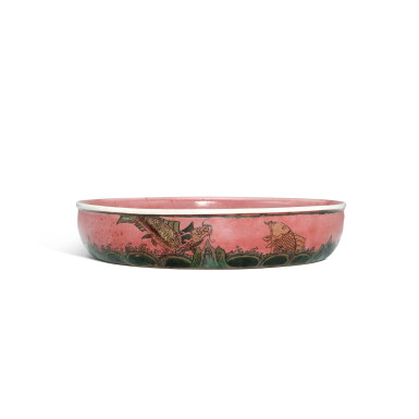 View full screen - View 1 of Lot 3313. A rare red-ground and yellow and green-enamelled 'dragon and fish' basin, Qing dynasty, Kangxi period | 清康熙 紅地黃綠彩鯉躍龍門圖洗.
