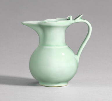 View full screen - View 1 of Lot 16. A VERY RARE SMALL CELADON-GLAZED 'MONK'S CAP' EWER, QIANLONG SEAL MARK AND PERIOD | 清乾隆 粉青釉僧帽壺 《大清乾隆年製》款.