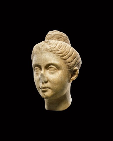 View full screen - View 1 of Lot 195. A Roman Marble Portrait Head of a Woman, mid 2nd Century A.D..
