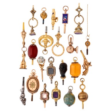 View full screen - View 1 of Lot 248. A group of 22 mixed media keys and fobs with mounts including metal, enamel and hardstone Various origins and dates.