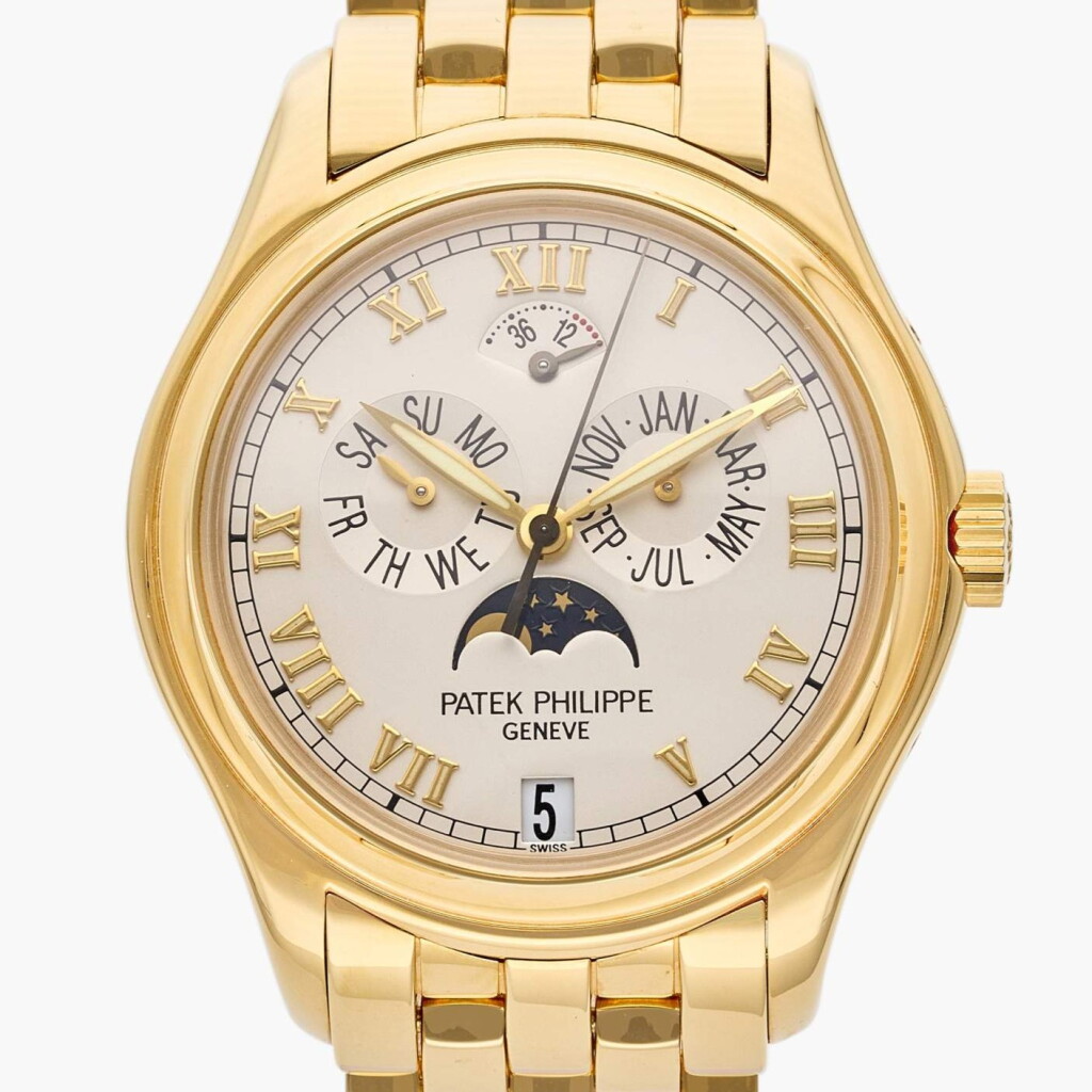 View full screen - View 1 of Lot 69. Reference 5036/1J-001 | A yellow gold automatic annual calendar wristwatch with moon phases, power reserve indication, and bracelet, Circa 2001.