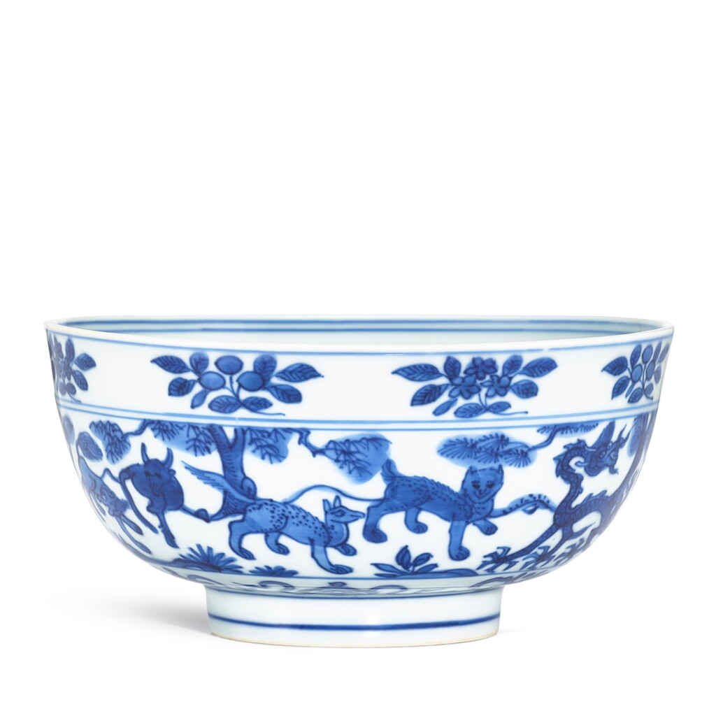 View full screen - View 1 of Lot 402. A blue and white 'mythical beast' bowl, Mark and period of Wanli 明萬曆 青花瑞獸紋盌 《大明萬曆年製》款.