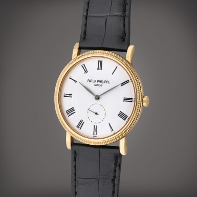 View full screen - View 1 of Lot 220. Reference 5119J Calatrava | A yellow gold wristwatch, Made in 2009.